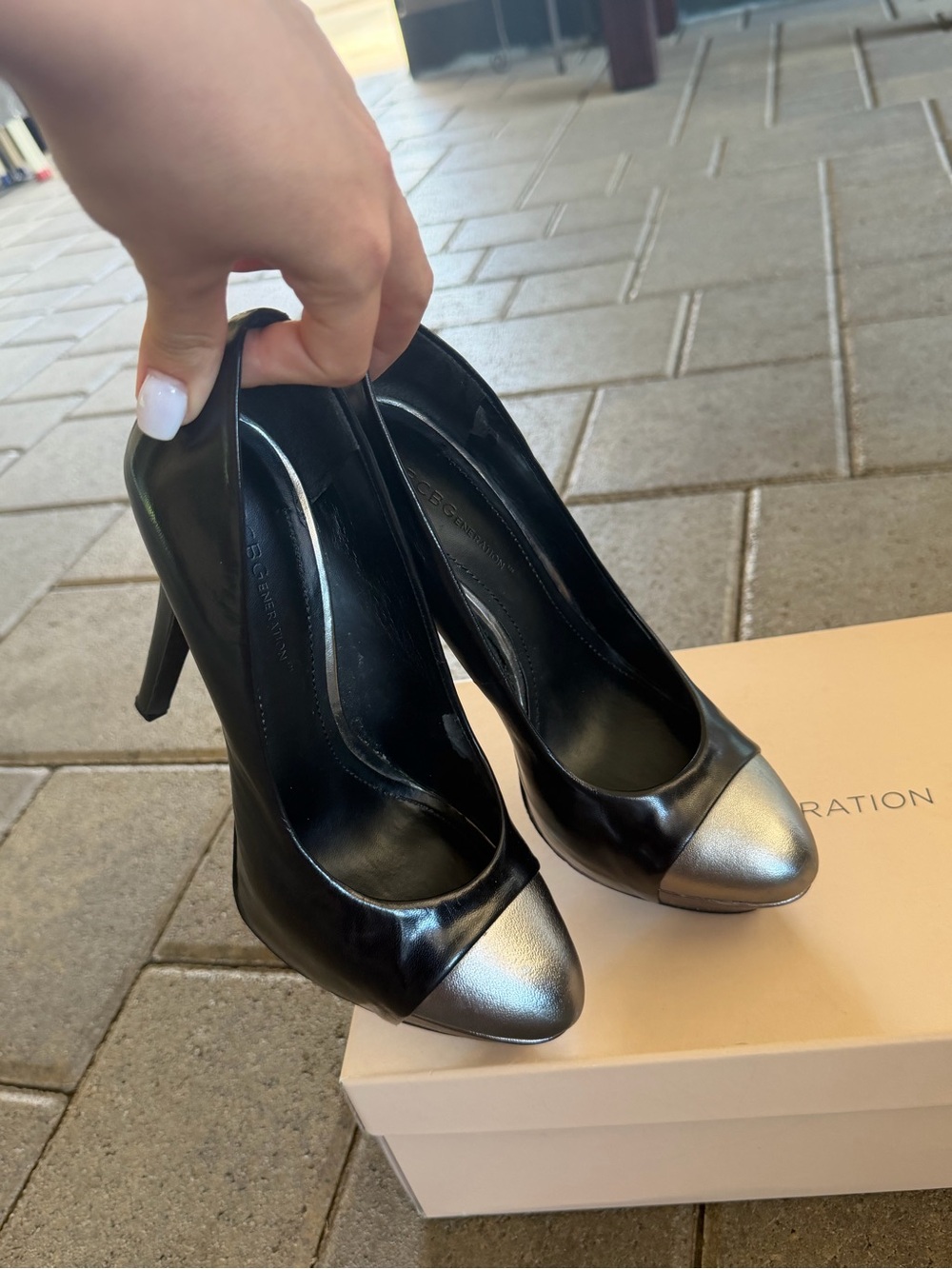 BCBGeneration Black Leather Pumps with Silver Cap Toe